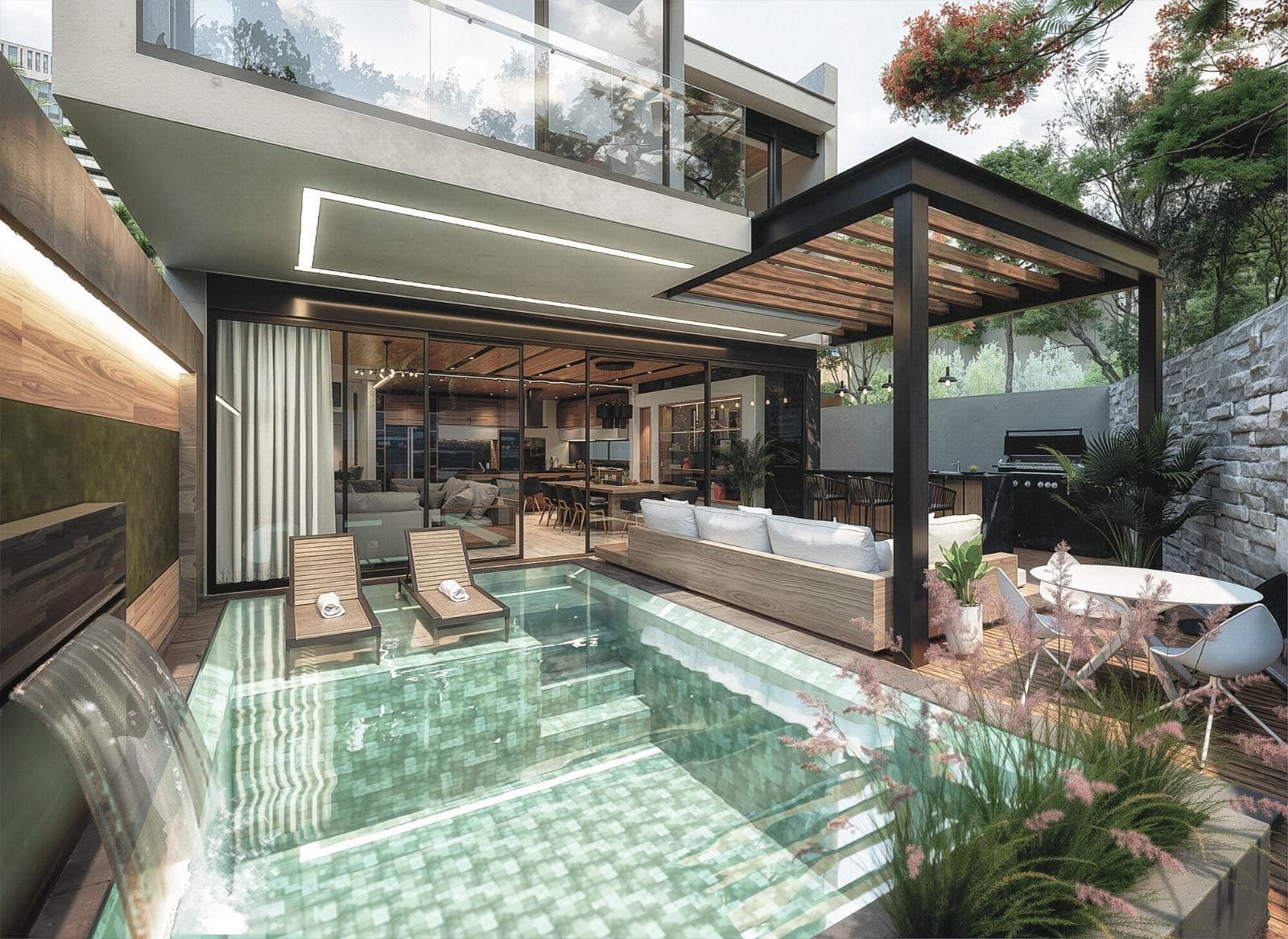 Alberca privada con cascada y luz led, junto a la terraza con asador